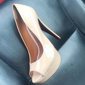 Never worn Schutz, these are so flattering!